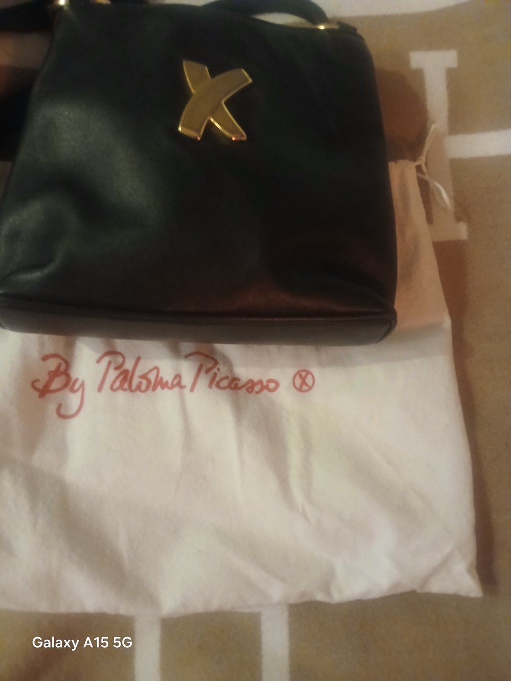 Paloma Picasso Black Leather Crossbody Bag with Gold Accent